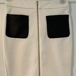 White pencil skirt with black leather pockets